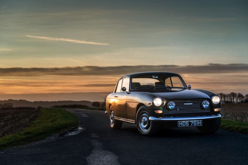 A Bristol 411 at dusk on an empty road