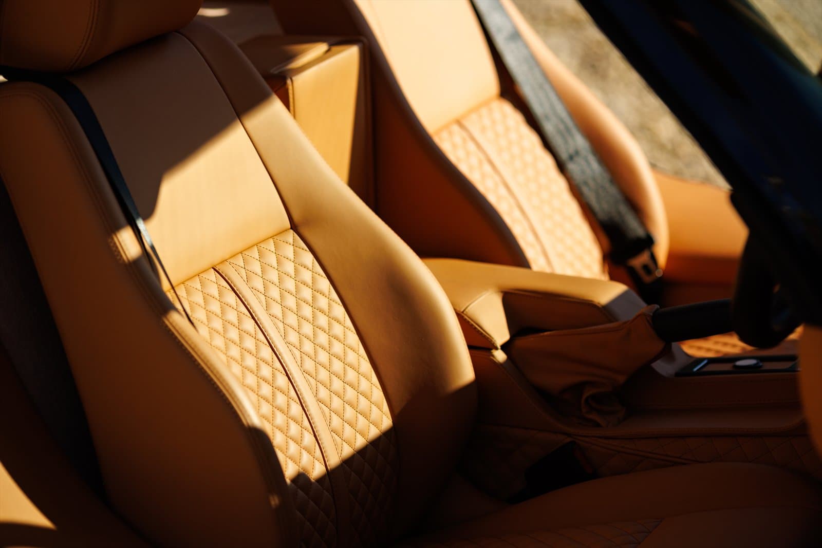 Hand-finished tan leather seat in the Bristol Fighter