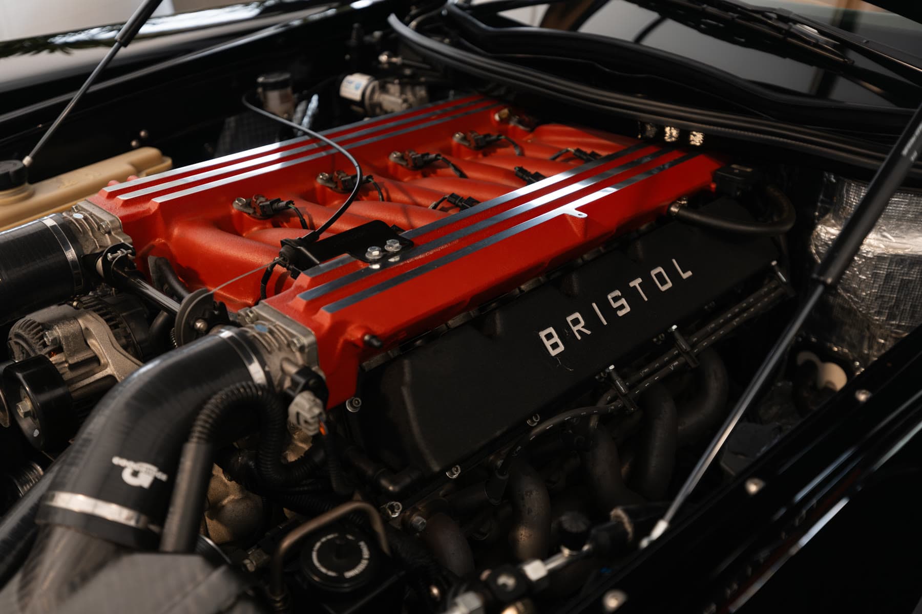The V10 engine bay of the completed black Bristol Fighter